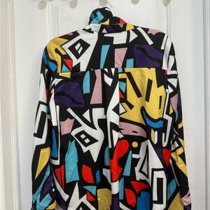 Women’s long sleeve blouse. Great for going out and or work.